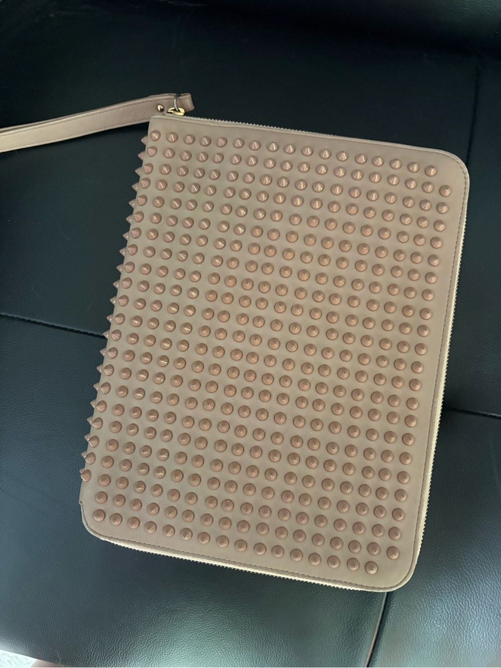 Christian Louboutin studded tablet case
